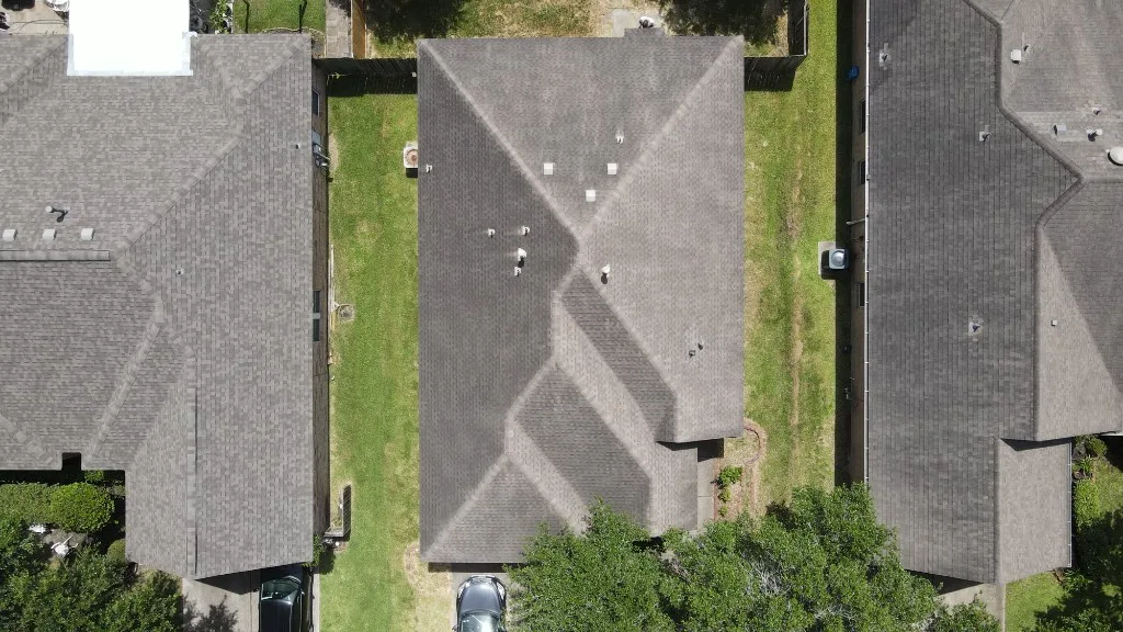 Aerial view of asphalt shingle roof covering materials