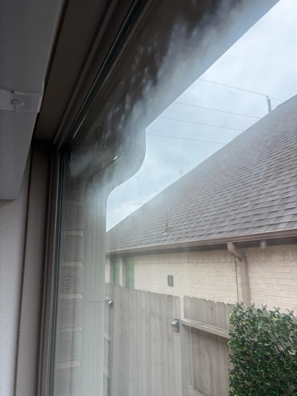 Fogged double-pane window indicating seal failure
